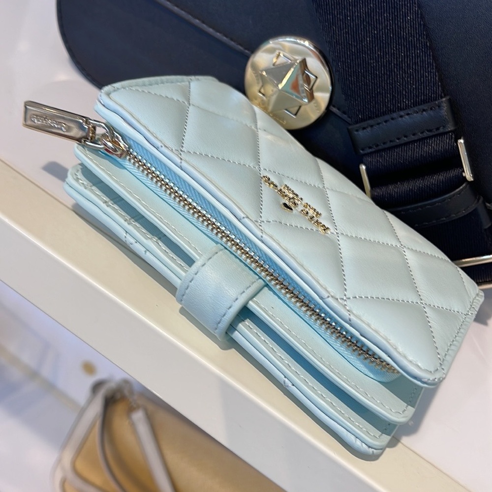 Kate Spade Carey Medium Compartment Bifold Wallet
COLOR: Turquoise - Picture 12 of 16